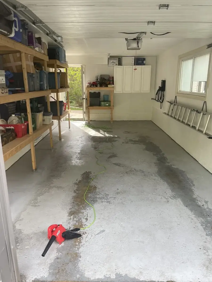 Cluttered single-car garage before professional deep clean service, Kitchener, Ontario